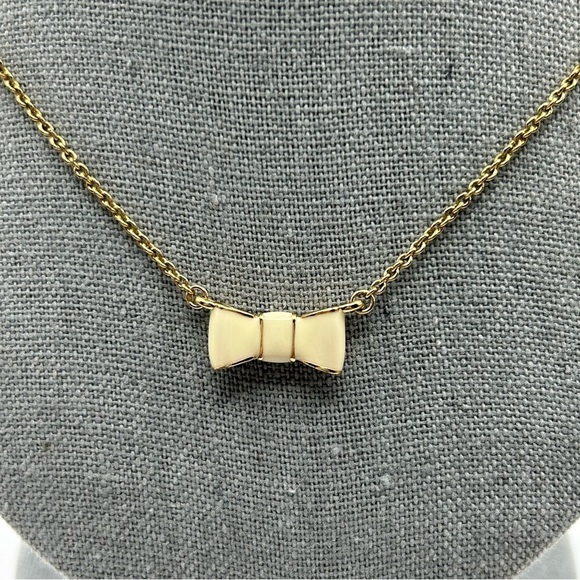 Kate Spade Gold Tone Chain with White Enamel Bow Ribbon Charm Short Necklace 19" - Picture 2 of 10
